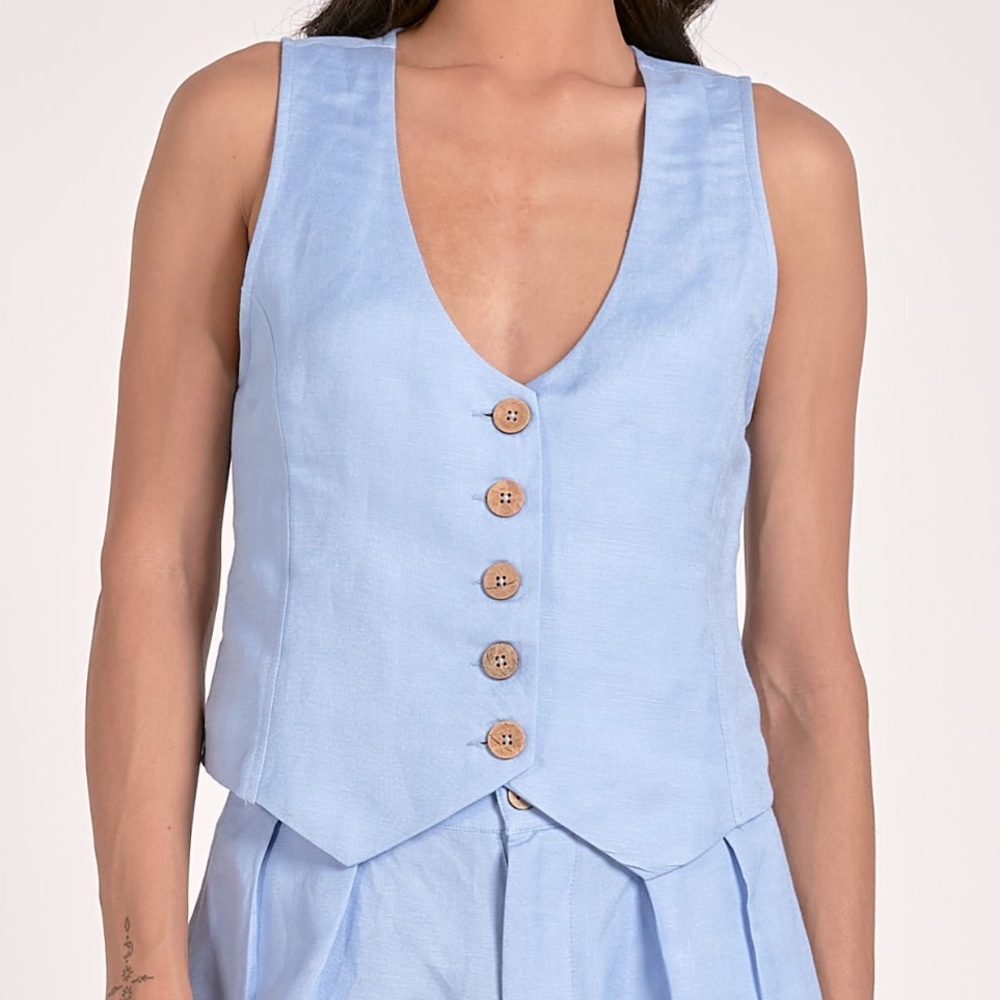 New with tags. Blue vest. Gorgeous buttons and fabric. Elan. Multiple sizes